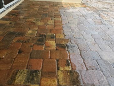 Newly sealed brick pavers with sheen
